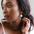 Female Model Wearing Statement Large Mismatched Crystal Star and Moon Pearl Drop Earrings