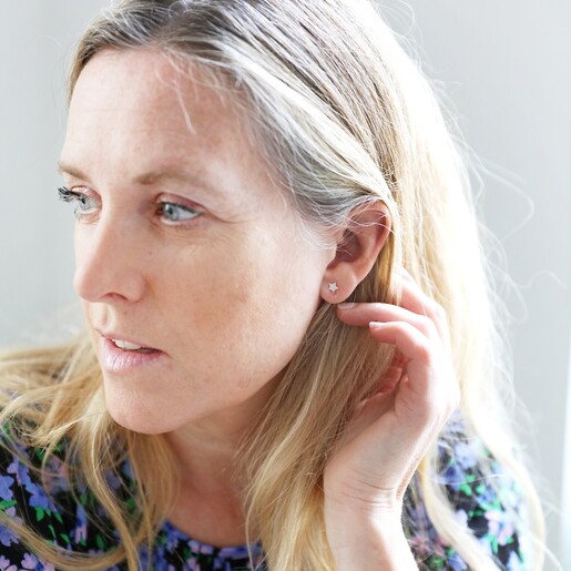 Model Wears Mismatched Star Stud Earrings in Silver From Lisa Angel