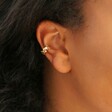 Close Up of Model Wearing Star Ear Cuff in Gold 