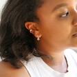 Model Wearing Star Ear Cuff in Silver With Other Silver Jewellery
