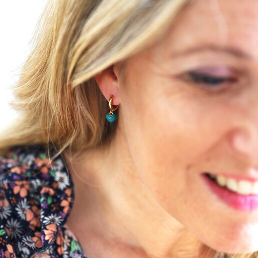 Blonde Model Wearing Teal Enamel Heart Charm Huggie Hoop Earrings