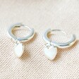 Open Polished Heart Huggie Hoop Earrings in Silver