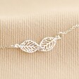 Close Up of Delicate Linked Filigree Leaf Necklace in Silver