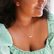 Model Wearing Linked Filigree Leaf Necklace in Silver From Lisa Angel