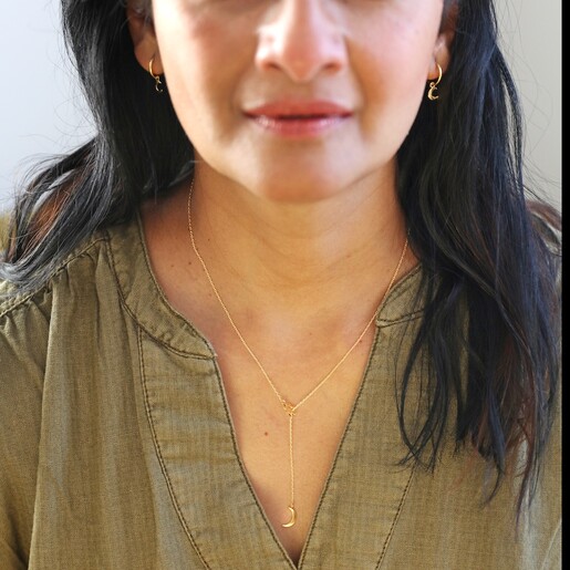 Lisa Angel Model Wearing Lisa Angel Moon and Sun Lariat Necklace in Gold