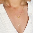 Model Wearing Moon and Sun Lariat Necklace in Gold