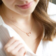 Personalised Mismatched Heart Outline Necklace in Rose Gold on Model