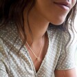 Model Wearing Lisa Angel Ladies' Rainbow Crystal Edge Star Pendant Necklace in Silver