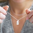 Model Holding Personalised Tiny Hammered Tag Pendant Necklace with Birthstone Charm