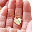 Close up of Personalised Spinning Heart Pendant Necklace with Model