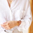 Ladies' Tala Lani Gold Sterling Silver Hammered ID Bracelet on Model
