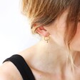 Model Wearing Luxury Tala Lani Gold Sterling Silver Interlocking Hoop Earrings