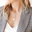 Model Wearing Tala Lani Sterling Silver Pearl and Ring Charm Necklace Layered With Other Tala Lani Jewellery