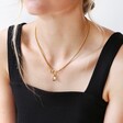 Model Wearing Tala Lani Gold Sterling Silver Pearl and Ring Charm Necklace