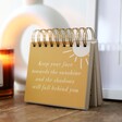 Keep your face towards the sunshine and the shadows will fall behind you phrase in Positivity Desktop Flip Chart 