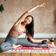 Model in Yoga Pose with Persian Rug Style Mat
