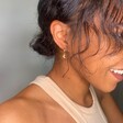 Model Wearing Lisa Angel Huggie Hoop Earrings