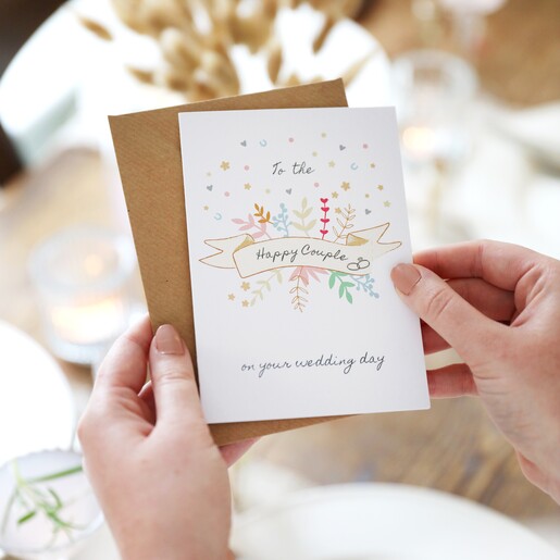 Hands Holding Lisa Angel To The Happy Couple Wedding Greeting Card