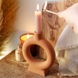 Terracotta Ring Candlestick Holder with Lit Candle