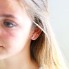 Model Wearing Enamel Forget Me Not Flower Earrings in Blue and Silver