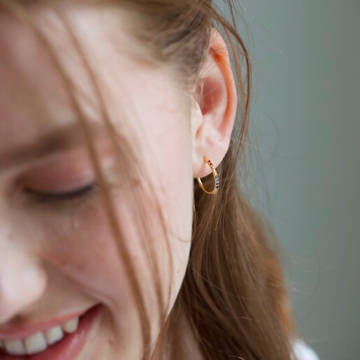 Rainbow Crystal Hoop Earrings in Gold From Lisa Angel on Model