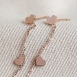 Close Up of Heart Studs on Stainless Steel Heart Drop Earrings in Rose Gold