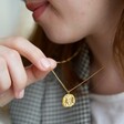 Gold Stainless Steel Gemini Pendant Necklace on Model