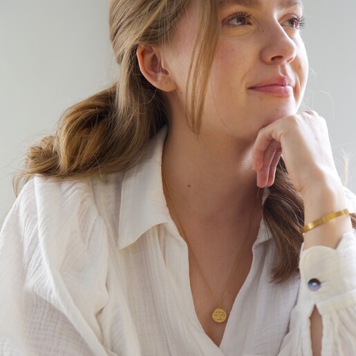 Lisa Angel Ladies' Gold Stainless Steel Libra Pendant Necklace on Model