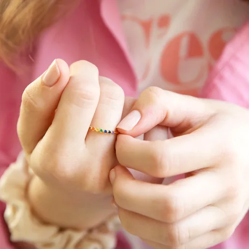 Model Wearing Ladies' Gold Sterling Silver Rainbow Crystal Band Ring