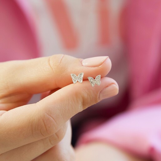 Sterling Silver Crystal Butterfly Stud Earrings Model Holding Ladies' Sterling Silver Crystal Butterfly Stud Earrings