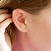 Female Model Wearing Delicate Tiny Crystal Moon Stud Earrings in Gold