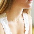 Model Wearing Stainless Steel Star Charm Necklace in Gold