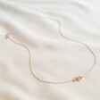 Full Length Shot of Delicate Tiny Interlocking Hearts Necklace in Rose Gold