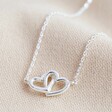 Delicate Tiny Interlocking Hearts Necklace in Silver