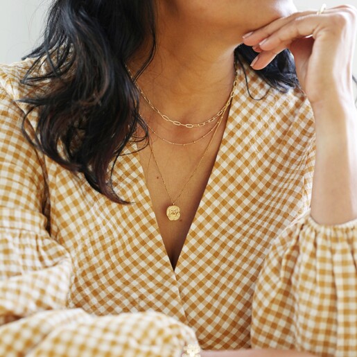 Gold Stainless Steel Aries Pendant Necklace on Model