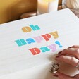 Close Up of Rainbow Oh Happy Day Wooden Hamper Box