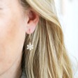 Model Wearing Snowflake Hoop Earrings