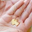 Model Holding Lisa Angel Personalised 60th Birthday Double Heart and Birthstone Necklace