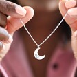 Model Holding Personalised Sterling Silver Crescent Moon Necklace