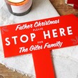 Close Up of Red Personalised Acrylic Father Christmas Please Stop Here Sign
