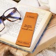 Personalised Leather 'Great Adventures' Bookmark in Book