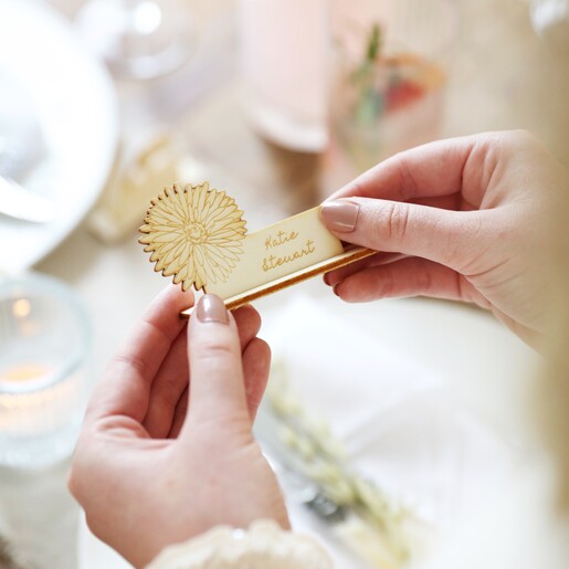 Model Holding Personalised Wooden Birth Flower Place Setting