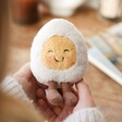 Model Holding Jellycat Blushing Boiled Egg Soft Toy