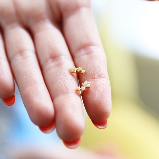 Model Holds Gold Sterling Silver Crystal Constellation Barbell Earrings