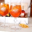Two Aperol Spritz Cocktail Glasses in front of cocktail kit