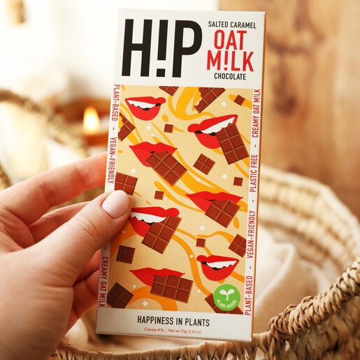 Model Holds H!P Chocolate: Salted Caramel Oat Milk Chocolate Bar