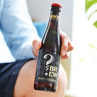 Bottle of Curious Brew British Lager Beer