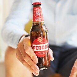 Bottle of Peroni Red Label Italian Lager Beer