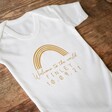 Personalised 'Welcome' Short Sleeved Babygrow on a Table