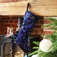 Personalised Large Starry Blue Velvet Christmas Stocking on Fireplace